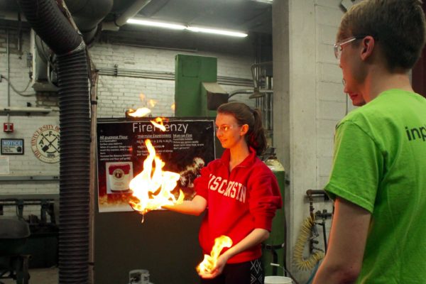 Student demonstrates her hand on fire photo